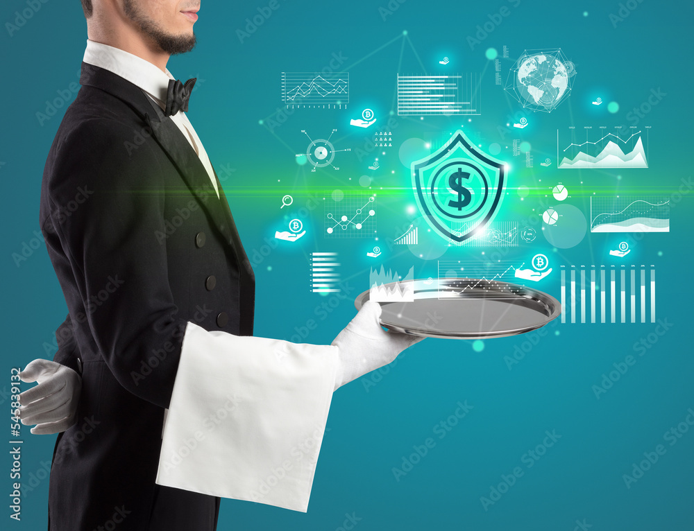 Handsome young waiter in tuxedo holding currency icons on tray Handsome young waiter in tuxedo holding currency icons on tray