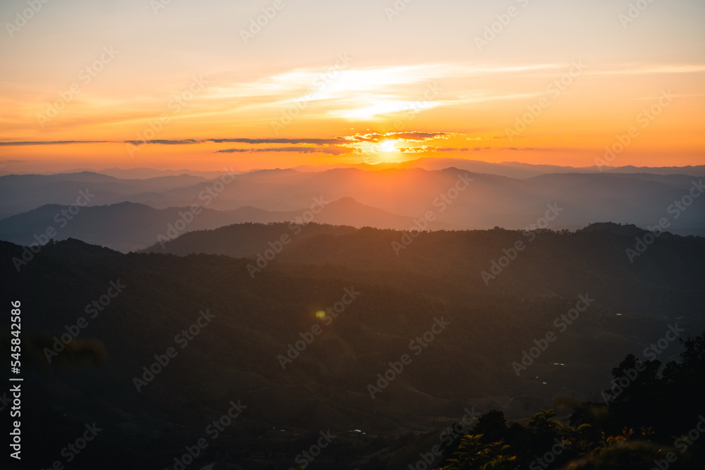 Scenic View Of Mountains During Sunset Scenic View Of Mountains During Sunset