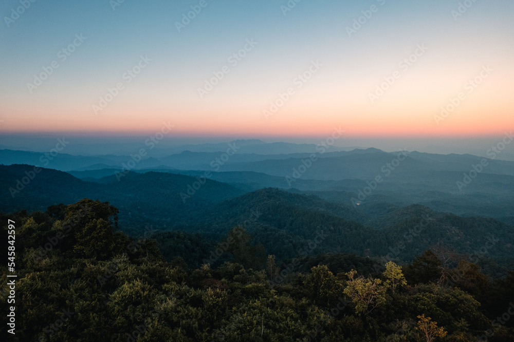 Scenic View Of Mountains During Sunset Scenic View Of Mountains During Sunset