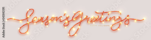 Seasons greetings lettering realistic 3d inscription from christmas lights decorated garland. Tex from golden bright lamp bulb on ribbon. Horizontal web poster, header for website. vector illustration