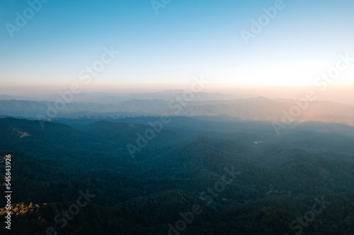 Scenic View Of Mountains During Sunset