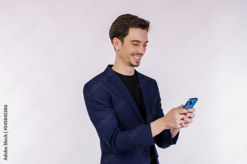 Portrait of a happy businessman using smartphone over white background Portrait of a happy businessman using smartphone over white background
