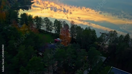 birds eye view at sunset over the lake and the residential area at baltezers in latvia photo