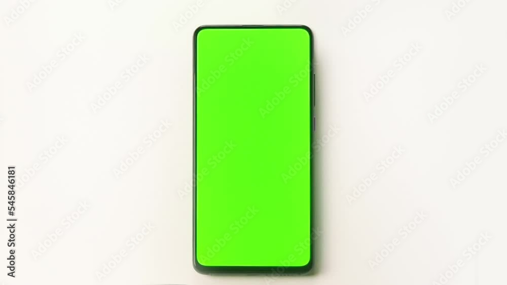 Business mobile smartphone with green screen on green background