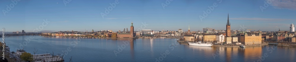 Panorama, the bay Riddarfjärden, old town Gamla Stan the down town with Town City Hall a sunny autumn day in Stockholm