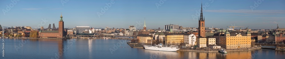 Panorama, the bay Riddarfjärden, old town Gamla Stan the down town with Town City Hall a sunny autumn day in Stockholm
