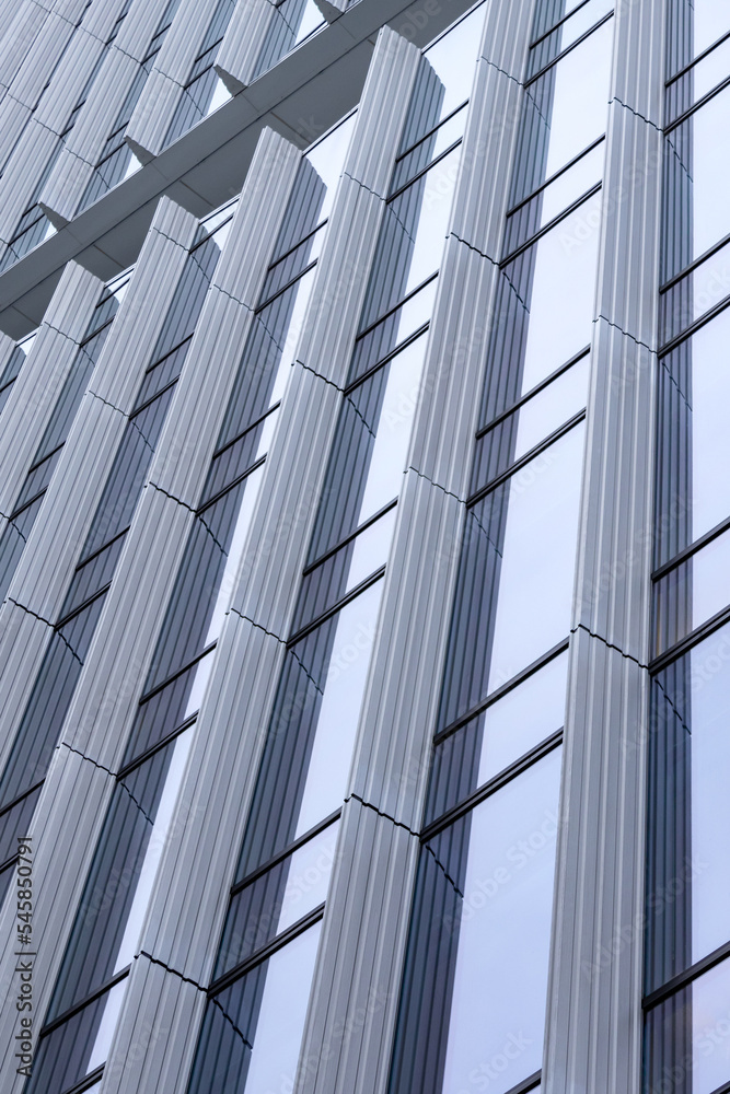  Facade of a high-rise building with metal structures.