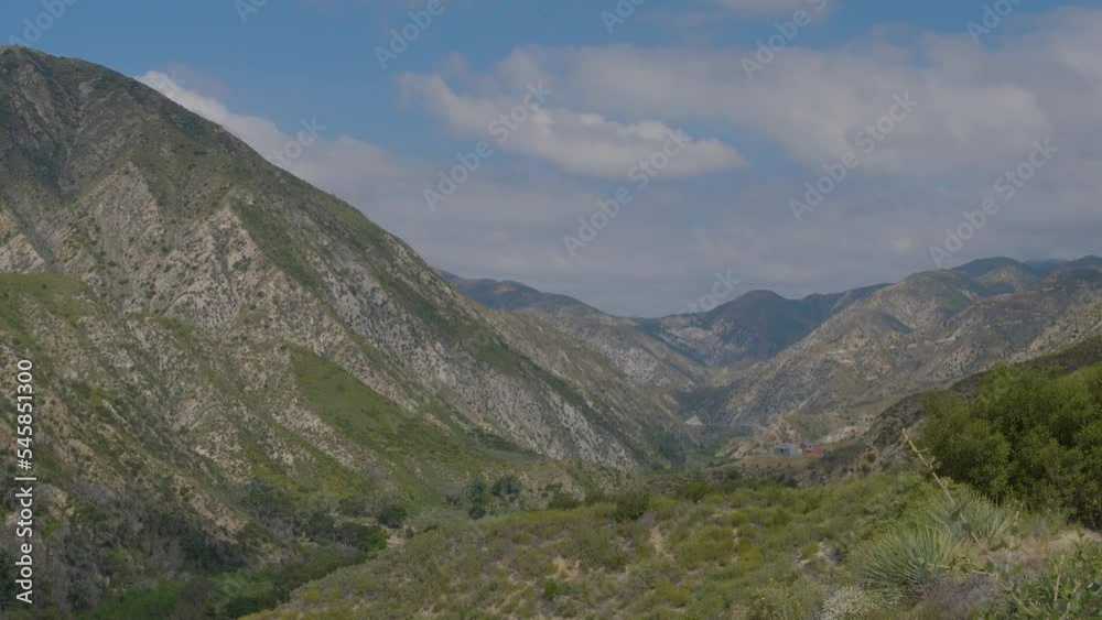 Time lapse of clouds moving over the Echo Mountains while seeing their shadows race across the ground located in Echo Mountain Trails California Time lapse of clouds moving over the Echo Mountains while seeing their shadows race across the ground located in Echo Mountain Trails California