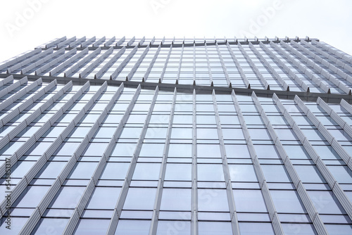 Facade of a high-rise building with metal structures.