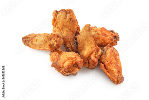 Breaded chicken drumstick, leg, wing and breast tenders strips on white background with shadow