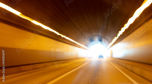 Car in the tunnel in motion.