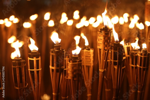 Torches at night with yellow flames and highlights