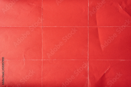 Folded red poster paper texture photo