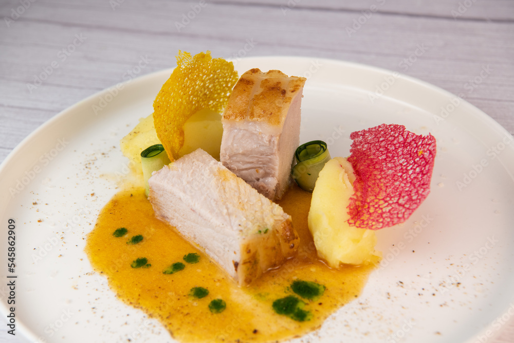 Recipe for Roast Pork Fillet with Mashed Potatoes and Coloured Lace Tiles. High quality photo