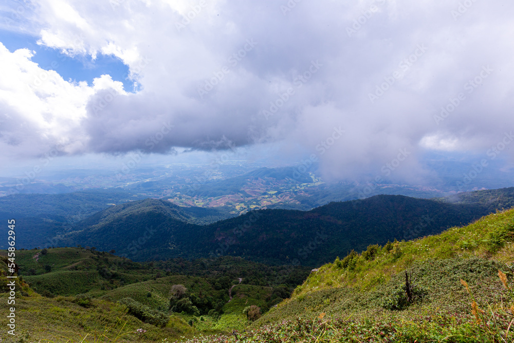 Fototapeta premium Trail up the mountain covered with fog
