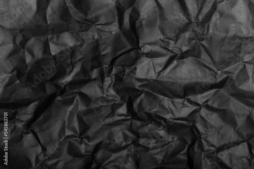 black paper texture background crumpled pattern  © Heleno