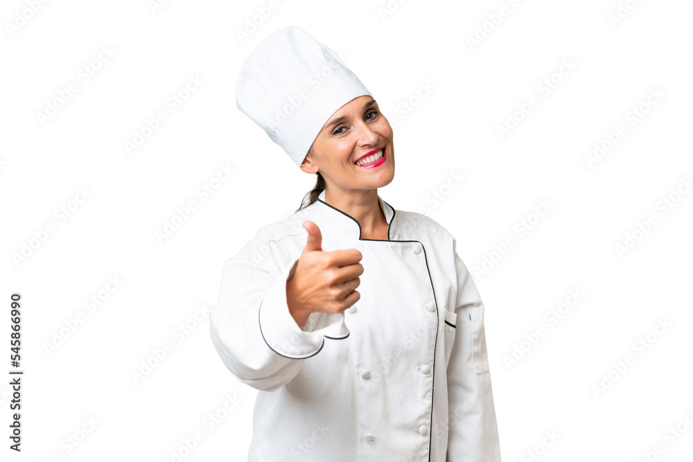 Middle-aged chef woman over isolated background with thumbs up because something good has happened Middle-aged chef woman over isolated background with thumbs up because something good has happened