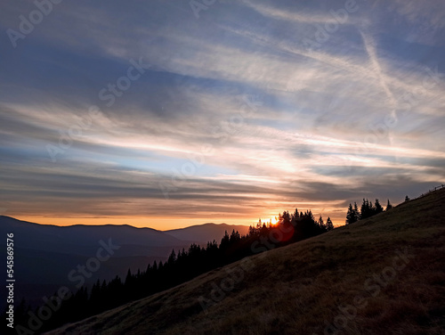 Carpathian mountains sunset landscape  Ukrainian Carpathians at dusk  hills  and peaks lit my sunshine