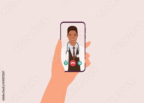 Patient’s Hand Holding Mobile Phone With Smiling Black Male Doctor On Video Call. Telemedicine. Telehealth. Close-Up. Flat Design Style, Character, Cartoon.