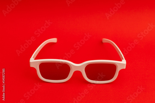 Movie glasses on a red background