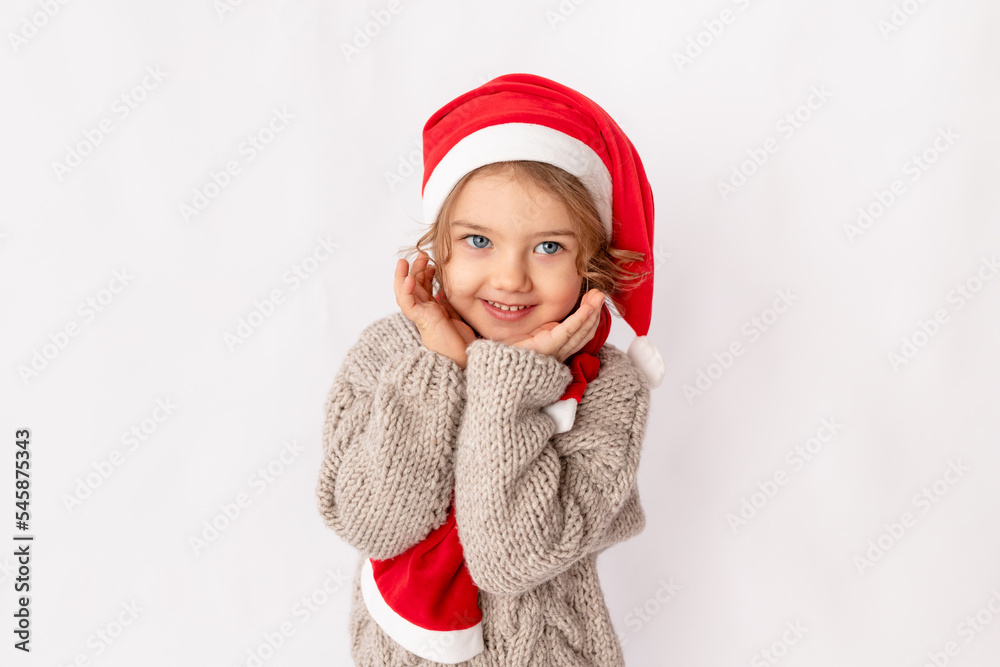 little girl in Santa hat on white background, space for text little girl in Santa hat on white background, space for text