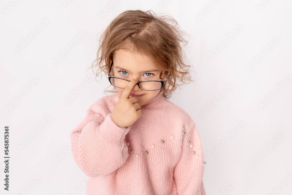small child girl with glasses on white background, space for text