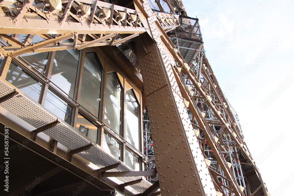 detail photograph of iron and rivets of the metal structure of the eiffel tower