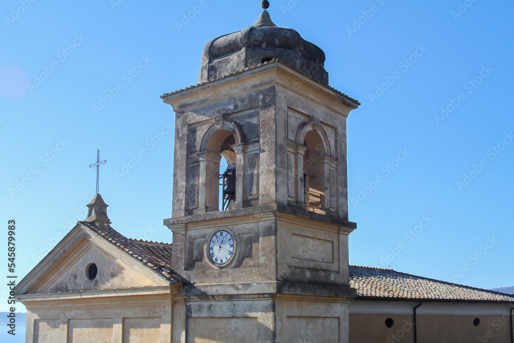 The Assumption of Mary Church in panoramic views ,built around 15th century with The square bell tower.Trevignano Romano,Italy