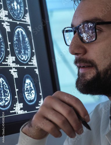 Doctor examining medical brain scan