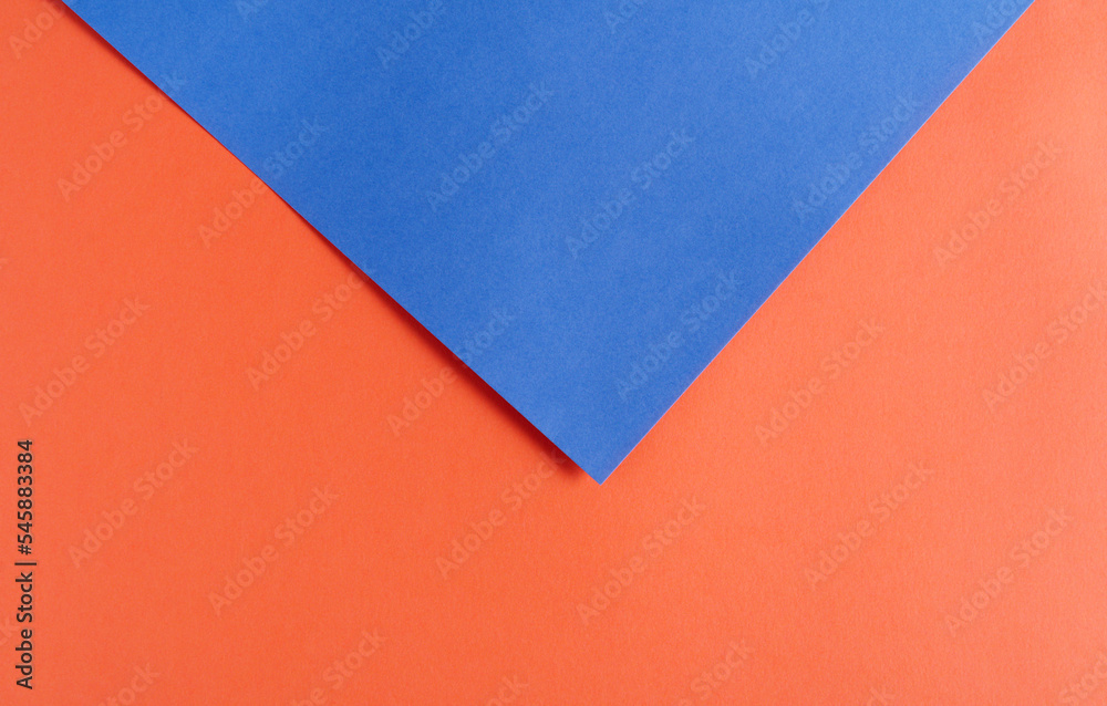 Background of blue and red paper in bright colors, geometric pattern. Background of blue and red paper in bright colors, geometric pattern.