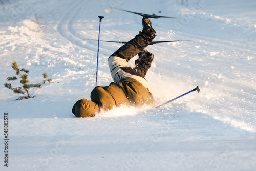 Canvas Print Man Falling while Cross Country Skiing