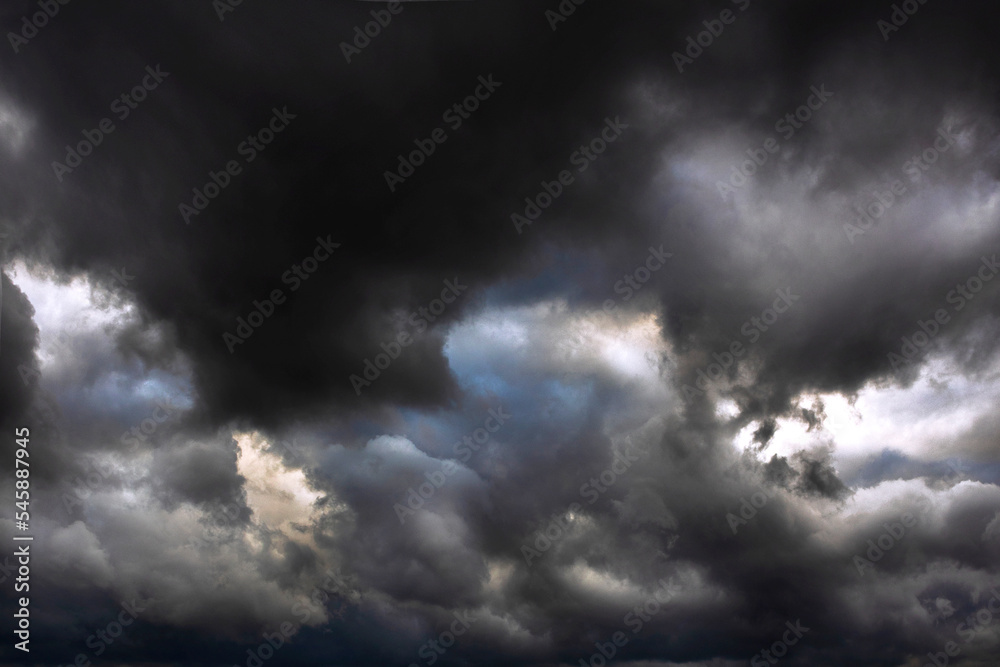 Stormy sky. The sky before the rain. It's going to rain soon. Black clouds. Photo for background. Copy space.