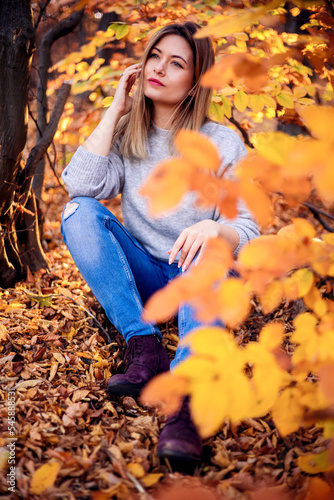 Beautiful  woman in autumn park