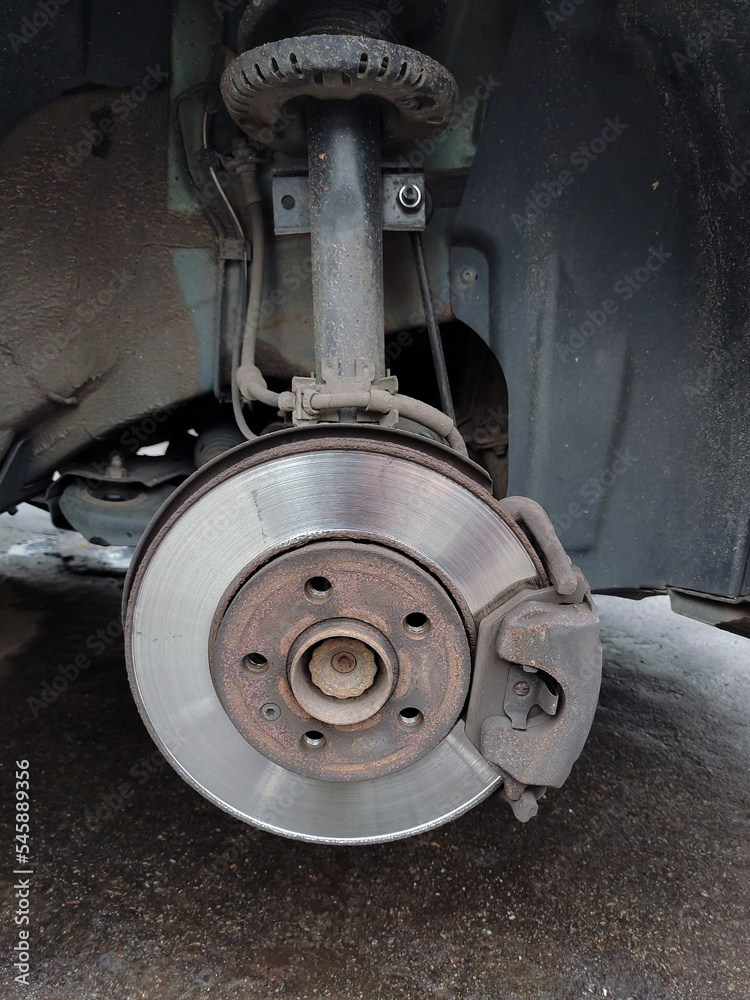 Front car disc and brake pad close-up