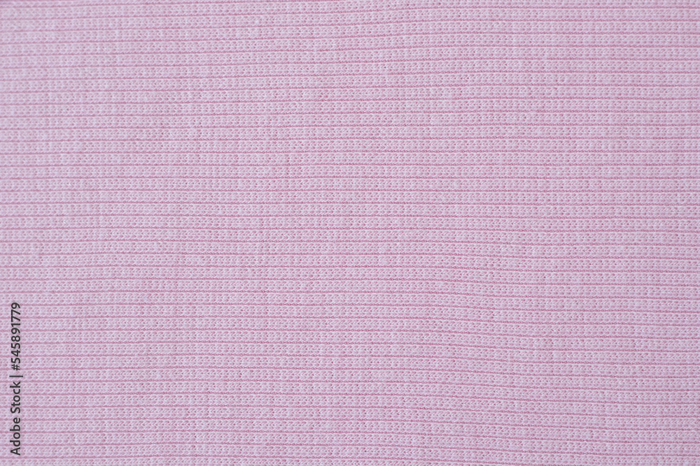 Delicate pink fabric with fine oblique knitting. Background for design and lettering. Delicate pink fabric with fine oblique knitting. Background for design and lettering.