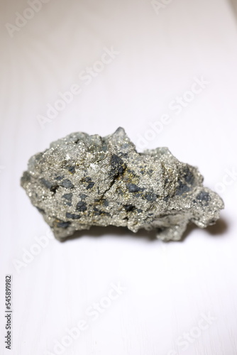 Pyrite crystal, or iron pyrite, on isolated white background, esoteric ore used to purify the energies of environments