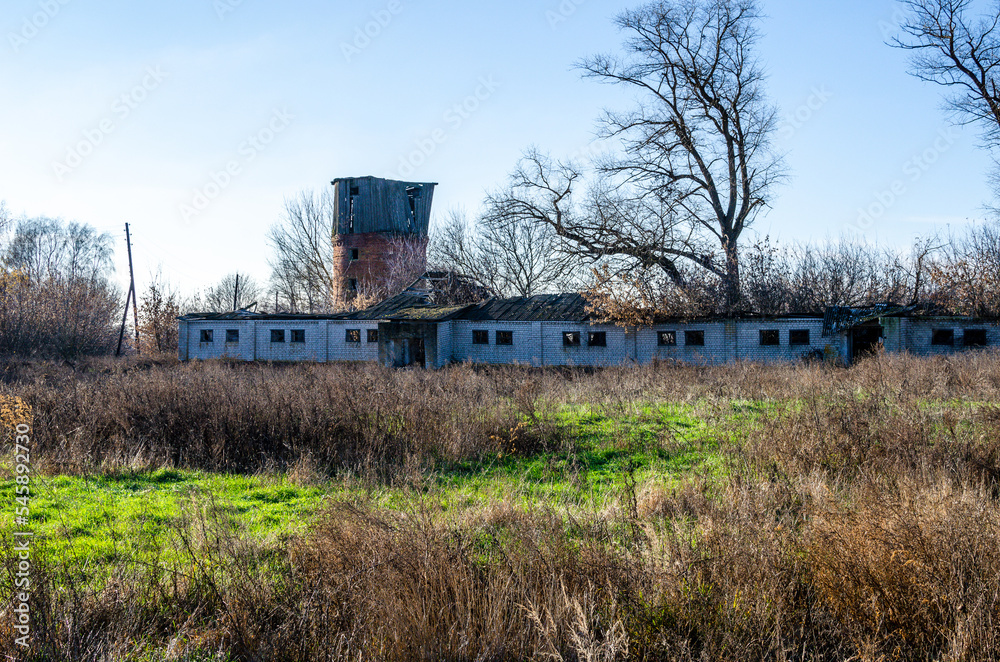 View of an abandoned farm. Old farm building all forgotten and falling down. View of an abandoned farm. Old farm building all forgotten and falling down.