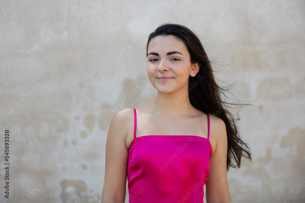 Portrait of a happy lovely and beautiful Spanish young woman in a park. Portrait of a happy lovely and beautiful Spanish young woman in a park.