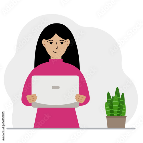 A woman is holding or using a laptop computer PC. Laptop computer technology concept.