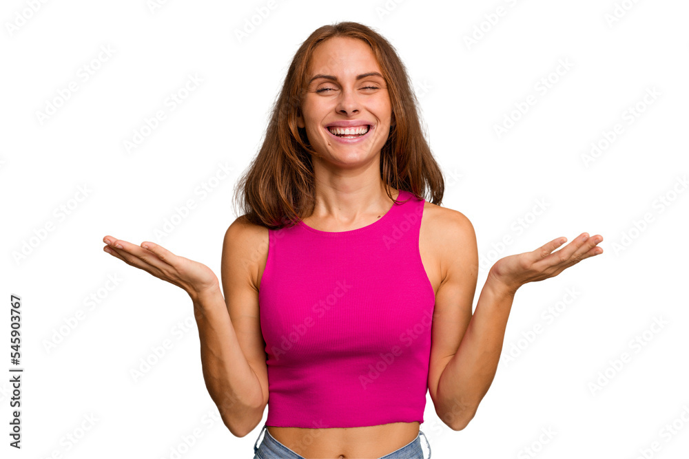 Young caucasian woman isolated makes scale with arms, feels happy and confident.