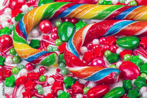 Christmas background of colorful candies and lollipops, macro photography