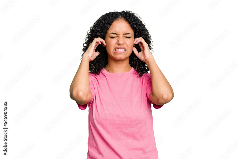 Young cute brazilian woman isolated covering ears with fingers, stressed and desperate by a loudly ambient. Young cute brazilian woman isolated covering ears with fingers, stressed and desperate by a loudly ambient.