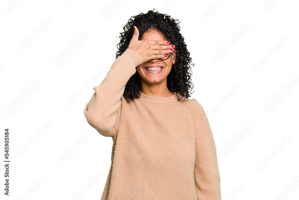 Young cute brazilian woman isolated covers eyes with hands, smiles broadly waiting for a surprise. Young cute brazilian woman isolated covers eyes with hands, smiles broadly waiting for a surprise.