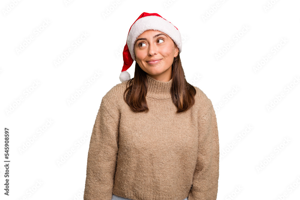 Young caucasian woman celebrating christmas wearing a santa hat isolated dreaming of achieving goals and purposes Young caucasian woman celebrating christmas wearing a santa hat isolated dreaming of achieving goals and purposes