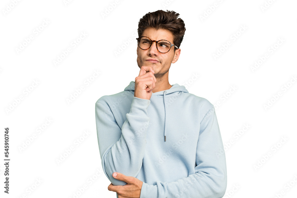 Young caucasian handsome man isolated thinking and looking up, being reflective, contemplating, having a fantasy. Young caucasian handsome man isolated thinking and looking up, being reflective, contemplating, having a fantasy.