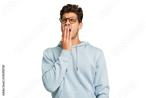Young caucasian handsome man isolated yawning showing a tired gesture covering mouth with hand.