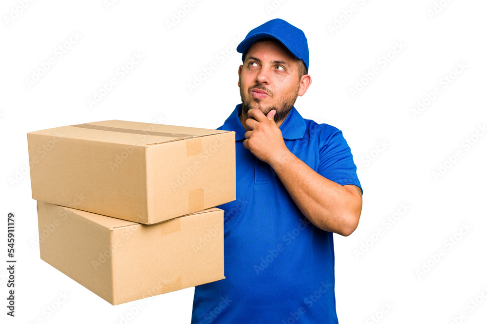 Delivery caucasian man isolated looking sideways with doubtful and skeptical expression. Delivery caucasian man isolated looking sideways with doubtful and skeptical expression.