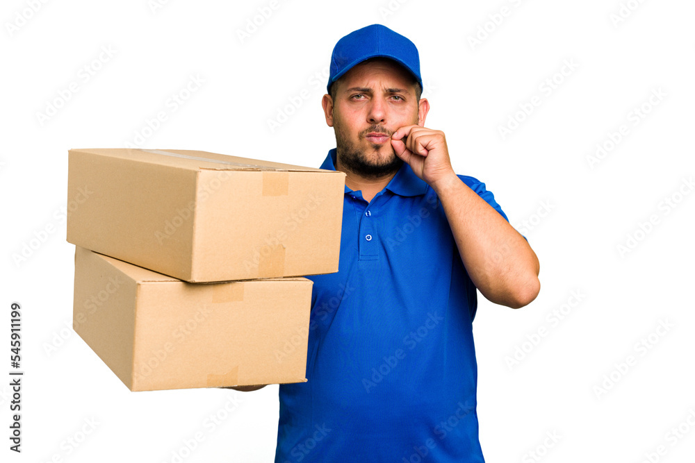 Delivery caucasian man isolated with fingers on lips keeping a secret. Delivery caucasian man isolated with fingers on lips keeping a secret.