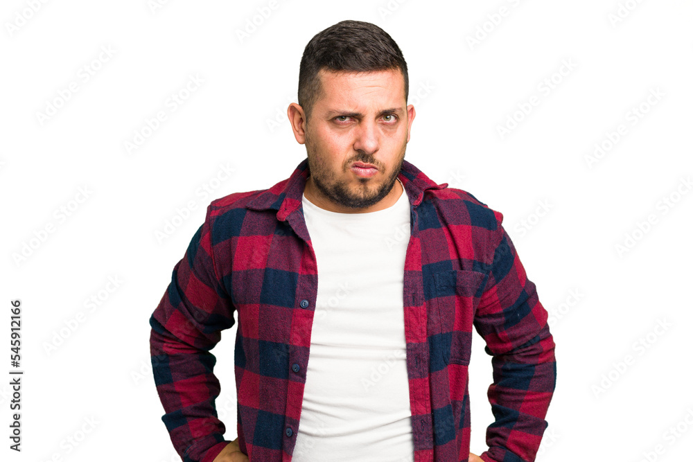 Young caucasian man isolated frowning face in displeasure, keeps arms folded. Young caucasian man isolated frowning face in displeasure, keeps arms folded.