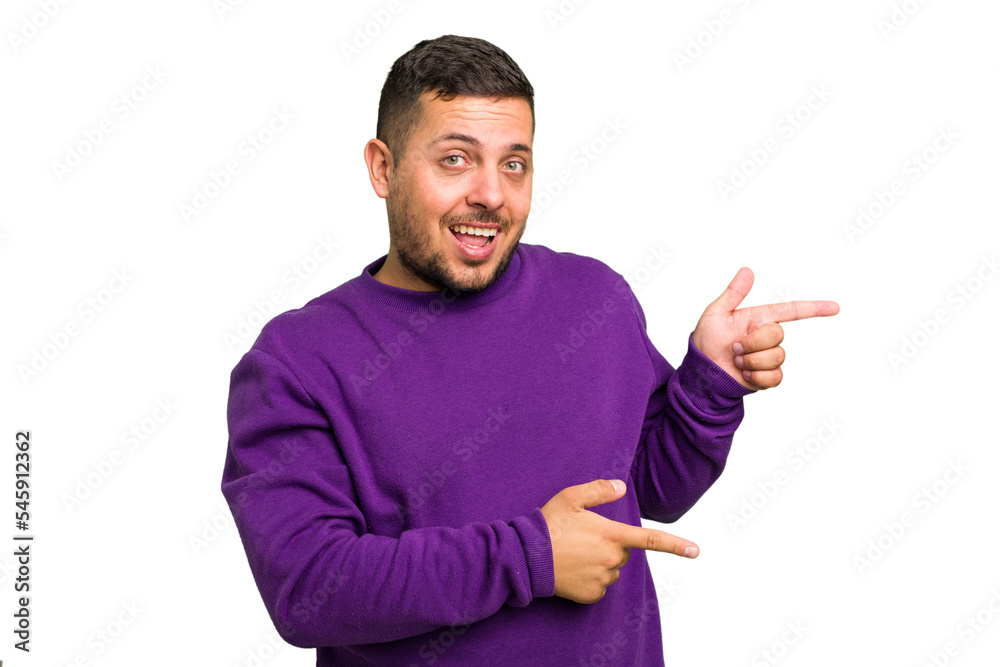 Young caucasian man isolated excited pointing with forefingers away. Young caucasian man isolated excited pointing with forefingers away.